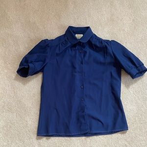 Pierre Lamonte blue collared shirt
